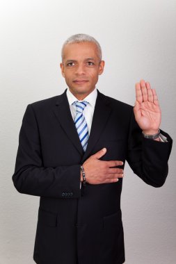 Businessman Taking Oath clipart