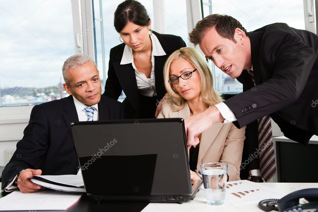 Business team at the meeting discussing work