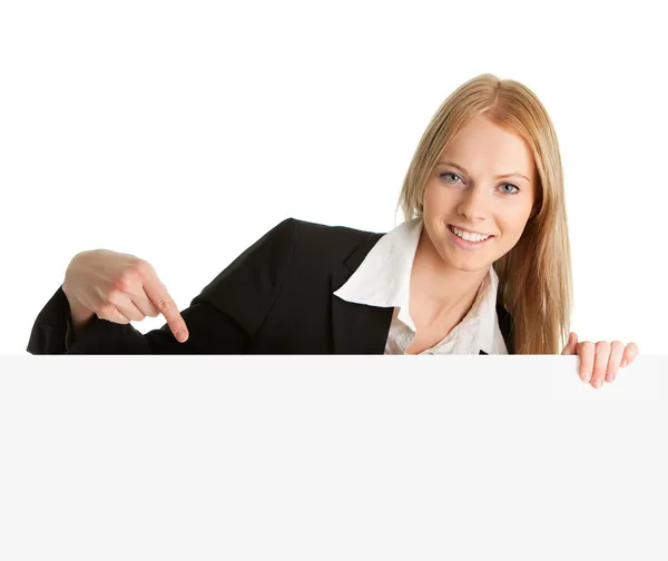 Vrolijke zakenvrouwen presenteren leeg bord — Stockfoto