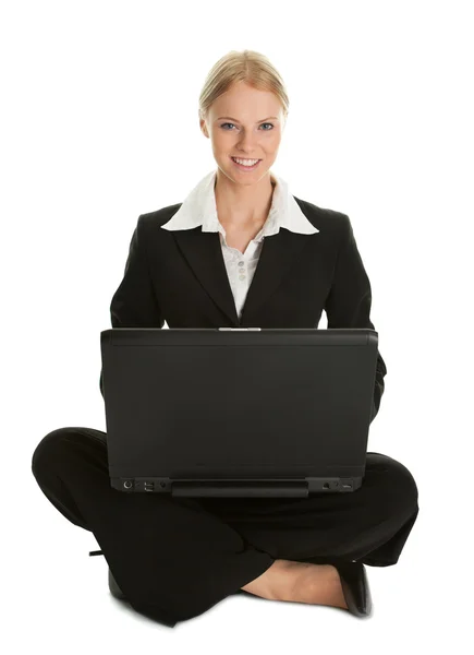 Zakelijke vrouw werkt op laptop Stockfoto