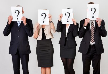 Group of unidentifiable business hiding under question marks clipart