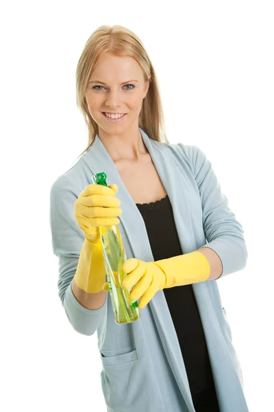 Vrolijke jonge dame spuiten schonere vloeistof — Stockfoto