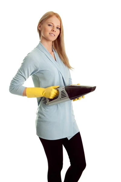 Cheerful woman with handheld vacuum cleaner — Stock Photo, Image