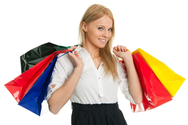 Bela jovem mulher carregando sacos de compras — Fotografia de Stock