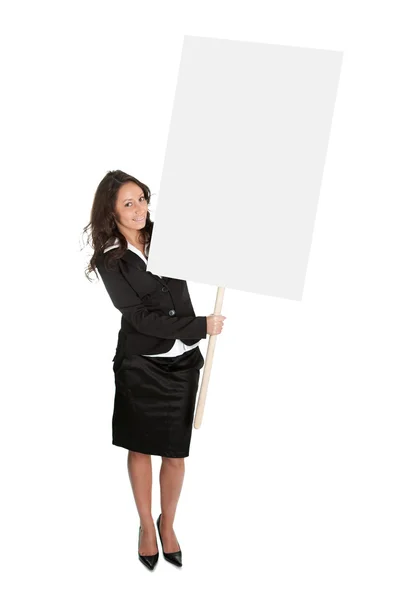 Cheerful businesswomen presenting empty board — Stock Photo, Image