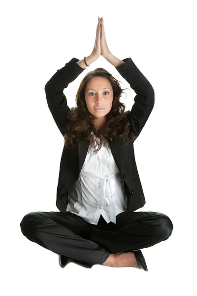 Businesswoman sitting in lotus flower position — Stock Photo, Image