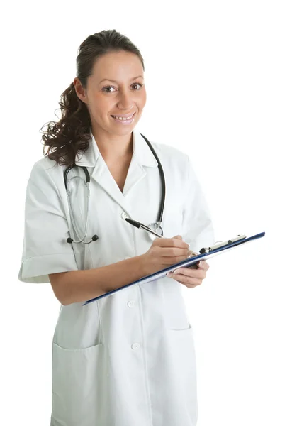 Médico alegre mulher preencher prescrição — Fotografia de Stock