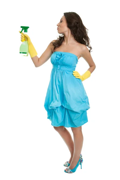 Jovencita alegre rociando líquido limpiador — Foto de Stock