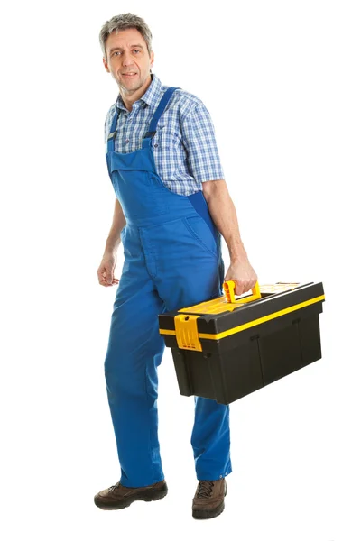Homem de serviço confiante com caixa de ferramentas — Fotografia de Stock