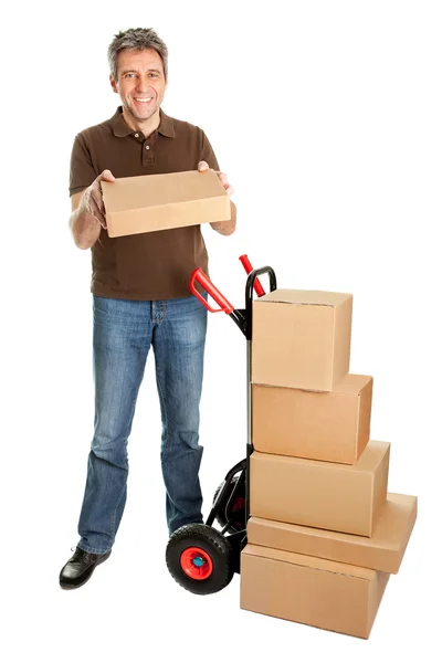 Delivery man holding the package — Stock Photo, Image