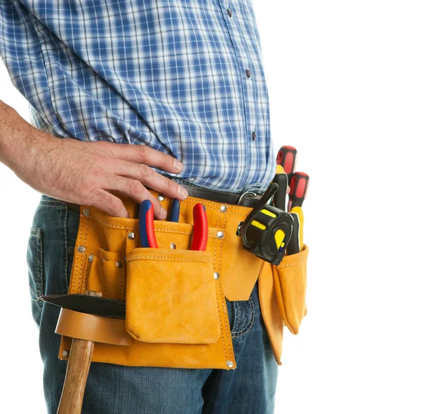 Close-up on worker's toolbelt Stock Picture