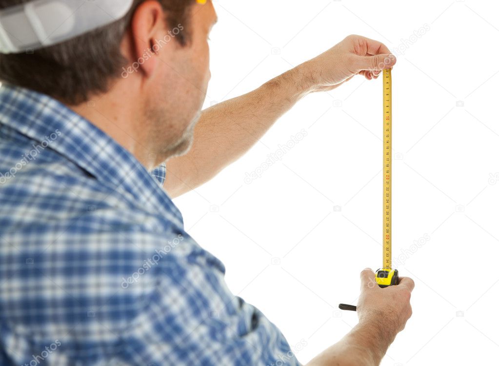 Confident worker measuring dimensions