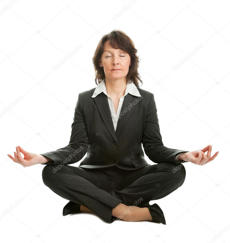 Businesswoman sitting in lotus position