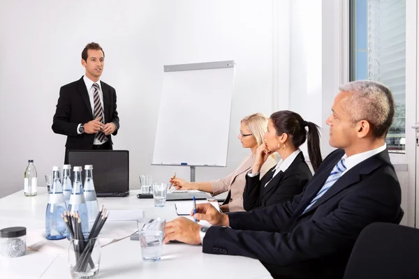 Businessman giving a presentation — Stock Photo, Image