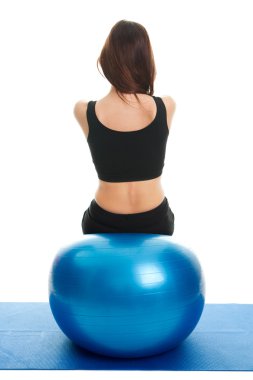 Fitness women exercising on fitness ball clipart