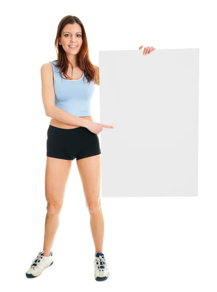 Fitness woman presenting empty placard — Stock Photo, Image