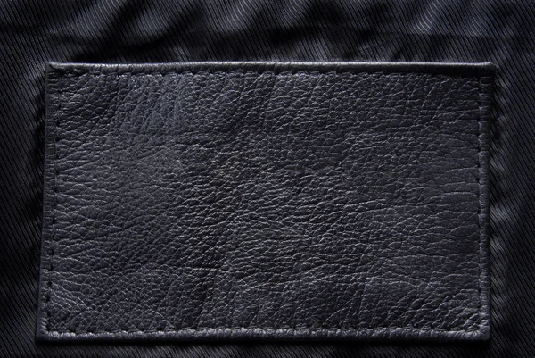 Black leather label — Stock Photo, Image
