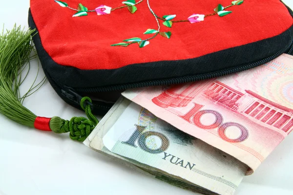 stock image Chinese tradition wallet with money on the white