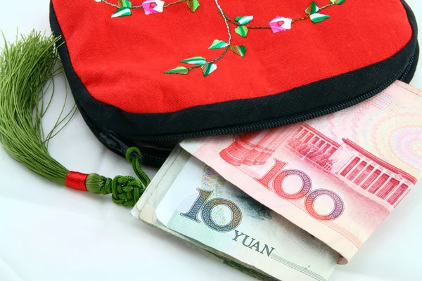 stock image Chinese tradition wallet with money on the white