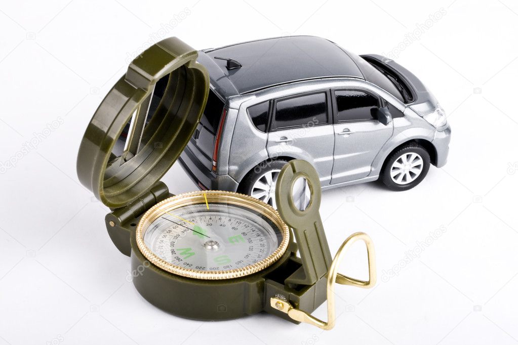 Compass and car on a white background