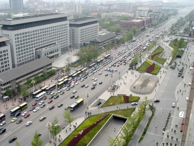 beijing's street and busy traffic in china clipart