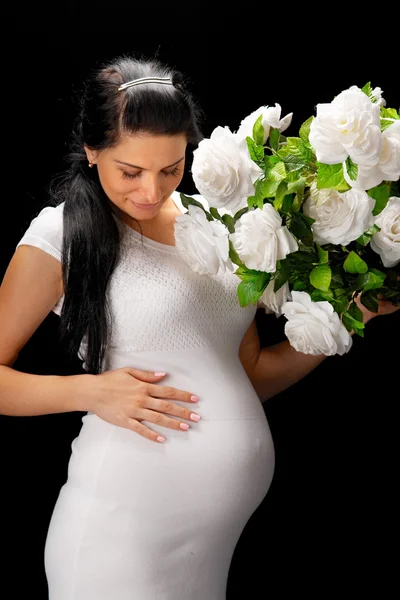 Gravidă cu trandafiri — Fotografie, imagine de stoc