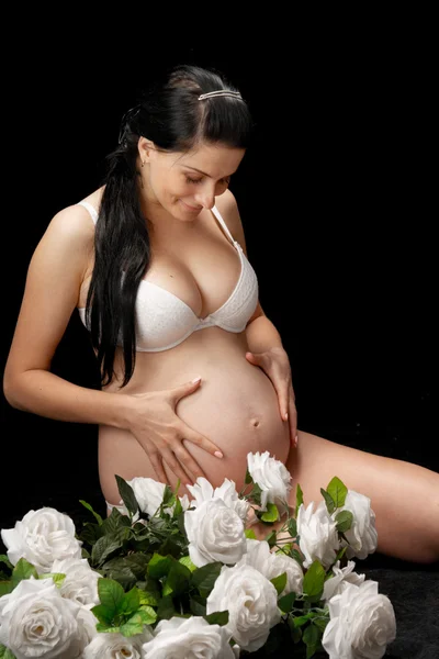 Gravid med rosor — Stockfoto