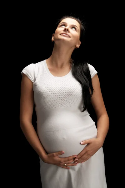 Ciąży na czarnym tle — Zdjęcie stockowe