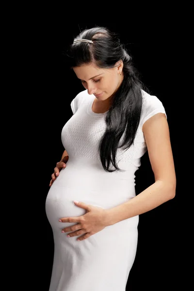 Gravid på svart bakgrund — Stockfoto