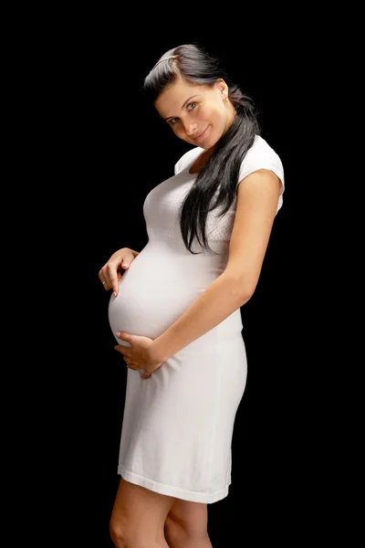 黒の背景に妊娠 — ストック写真