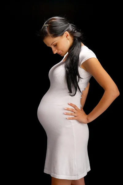 Ciąży na czarnym tle — Zdjęcie stockowe