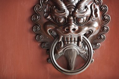 Antique oriental door knocker clipart