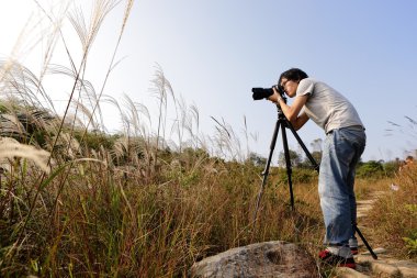 Photographer taking photo clipart