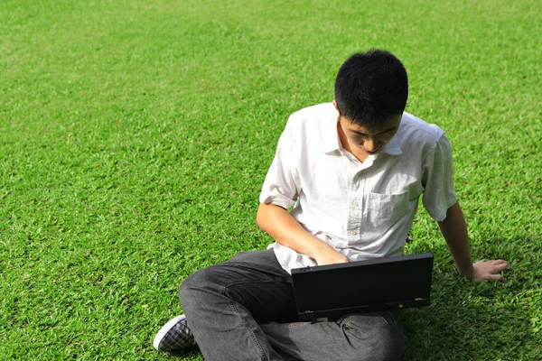 Asian Man Using Computer Outdoor — Stock Photo, Image