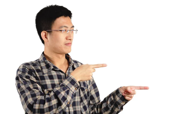 Young asian man pointing — Stock Photo, Image