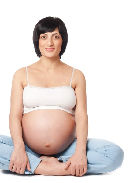Улыбающаяся беременная женщина Стоковая Картинка