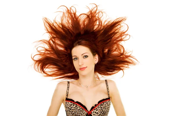 Kvinna med rött hår utspärrade Royaltyfria Stockfoton