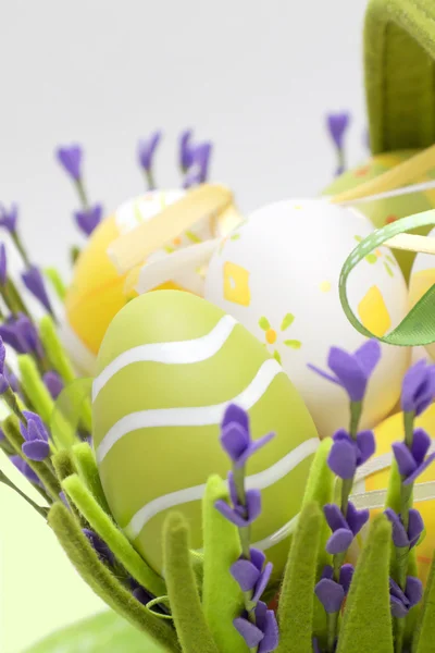 Basket with colourful eggs — Stock Photo, Image
