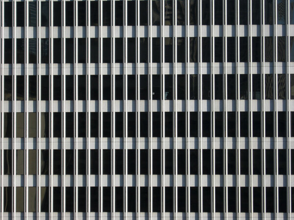 Modern Office building windows reflecting other buildings detail pattern. Good for patterns and backrounds.