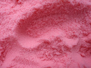 Large amount of bright pink bath salt with scoop holes in it. Good pattern. clipart