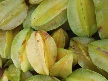 starfruit yığını satmak Oahu Çiftçi Market