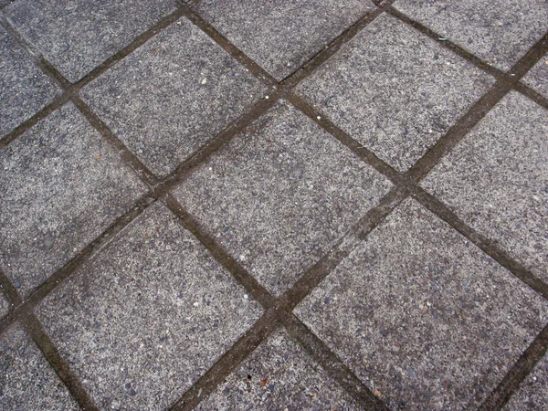 Diamond shaped concrete stone pathway — Stock Photo, Image