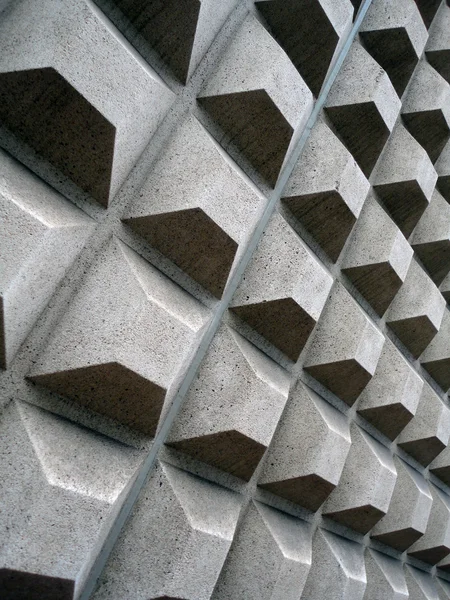 Square concret shapes project out of side wall — Stock Photo, Image