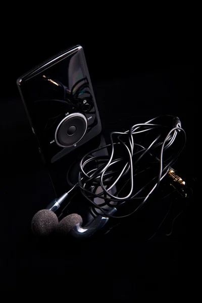 Black Mp3 Player Headphone Black Bakground — Stock Photo, Image