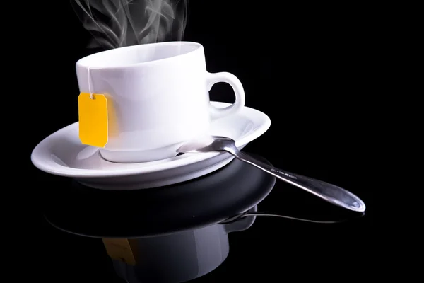 Tasse à thé avec une cuillère — Photo