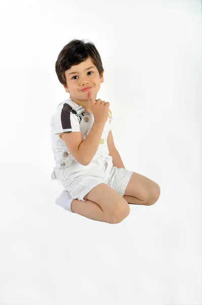 Мальчик на белом фоне — стоковое фото