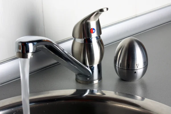 Faucet and timer — Stock Photo, Image