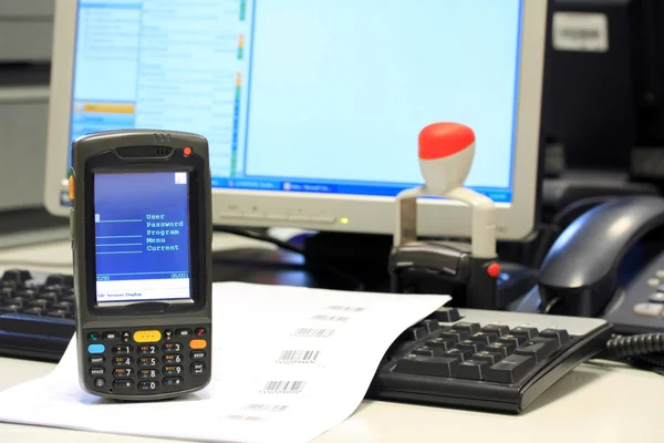 stock image Warehouse working place, bar code scanner on focus