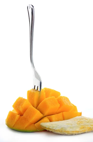 stock image Fresh mango with fork isolated on a white background