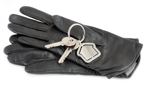 Gloves with house keys — Stock Photo, Image